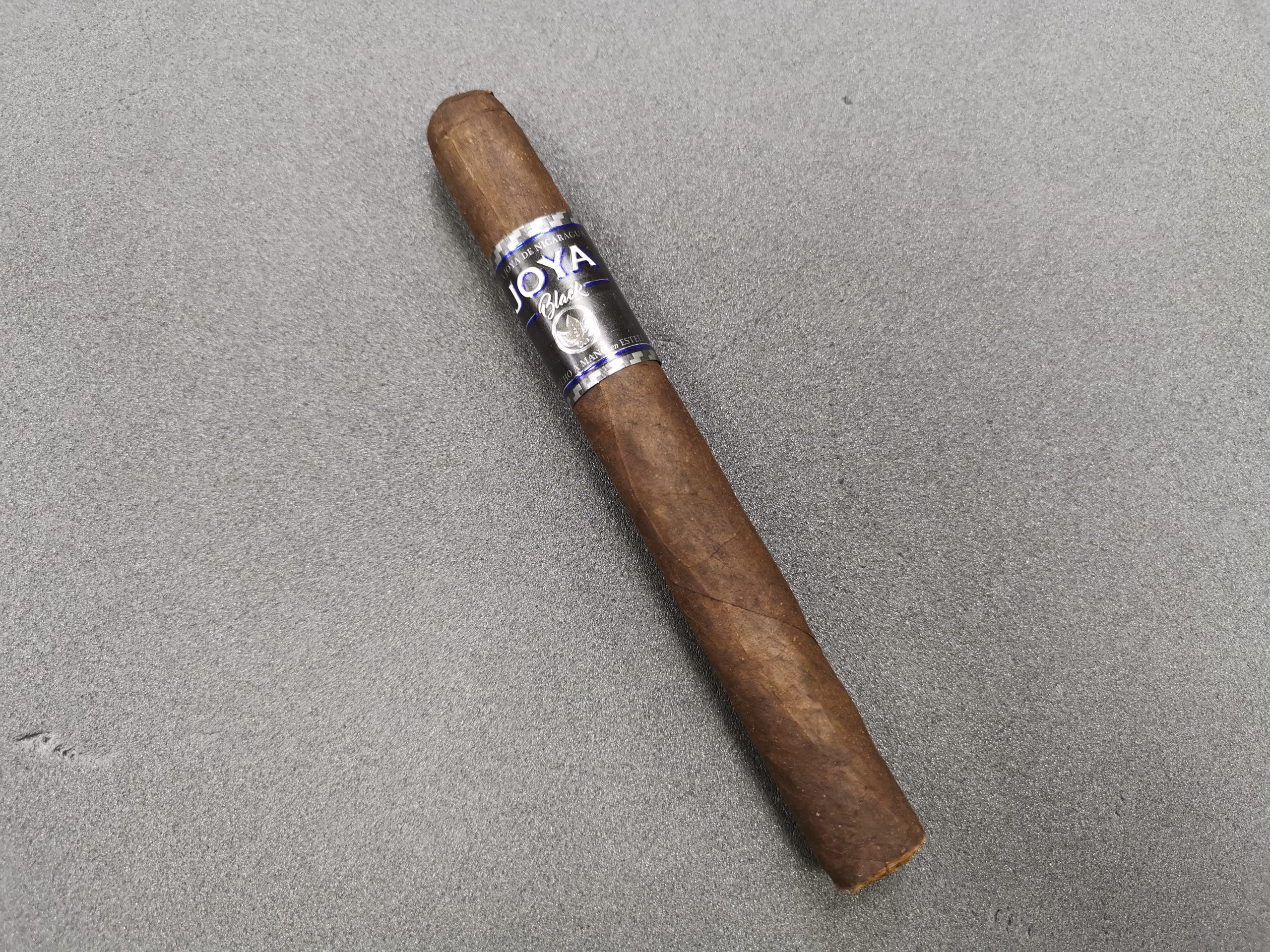 The Joya Black cigar is best described as "A balanced, rich and pleasant smoke". Filled with tobaccos from Nicaragua and binded in a local wrapper, this full fledged Nicaraguan cigar will not leave you disappointed. Medium bodied with an enjoyable full flavour smoke. Length: 6.25″ Cellophane Wrapped Single
